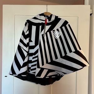 Brand new, has never been worn. Fits petite four year old  w room to grow.